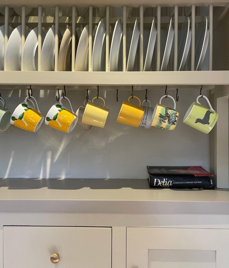 Suzannah & Co Sussex professional painting and decorating – interior & exterior painting, wallpapering, kitchen furniture cabinetry refinishing in Sussex. Image of hanging cups.