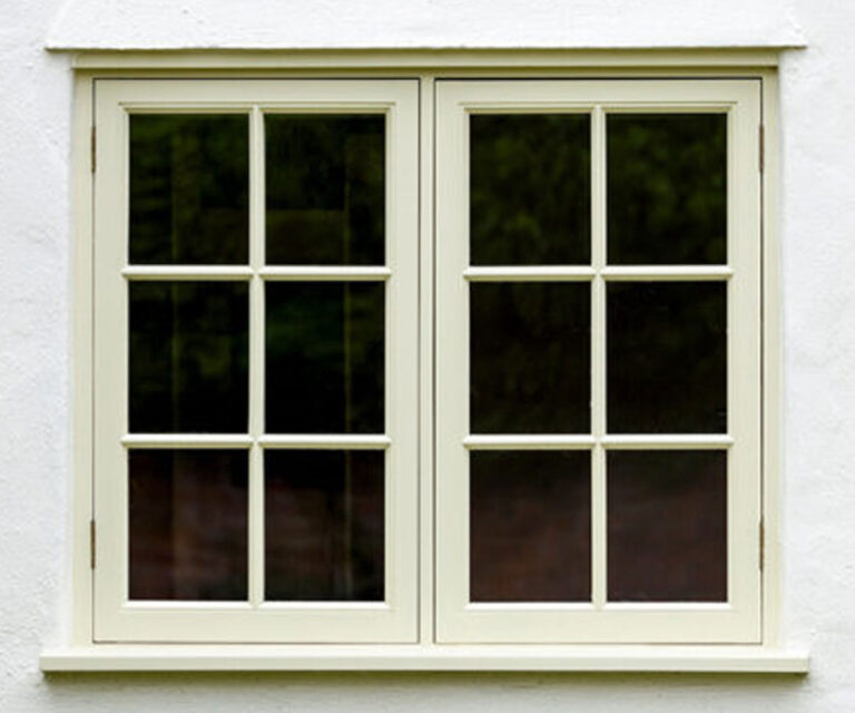 Suzannah & Co - professional painting and decorating – interior & exterior painting, wallpapering, kitchen furniture cabinetry refinishing in and around Sussex. Image of painted window.