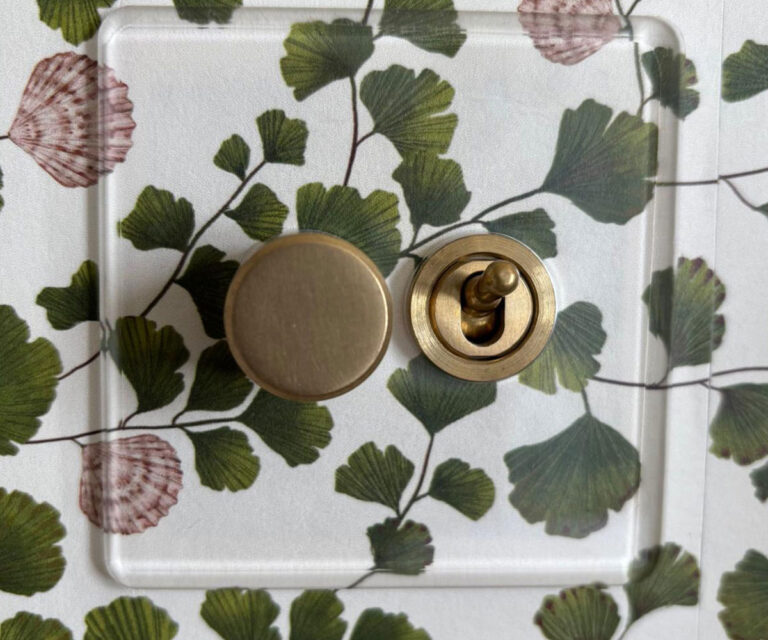 Suzannah & Co - professional painting and decorating – interior & exterior painting, wallpapering, kitchen furniture cabinetry refinishing in and around Sussex. Image of plug socket and wallpaper.